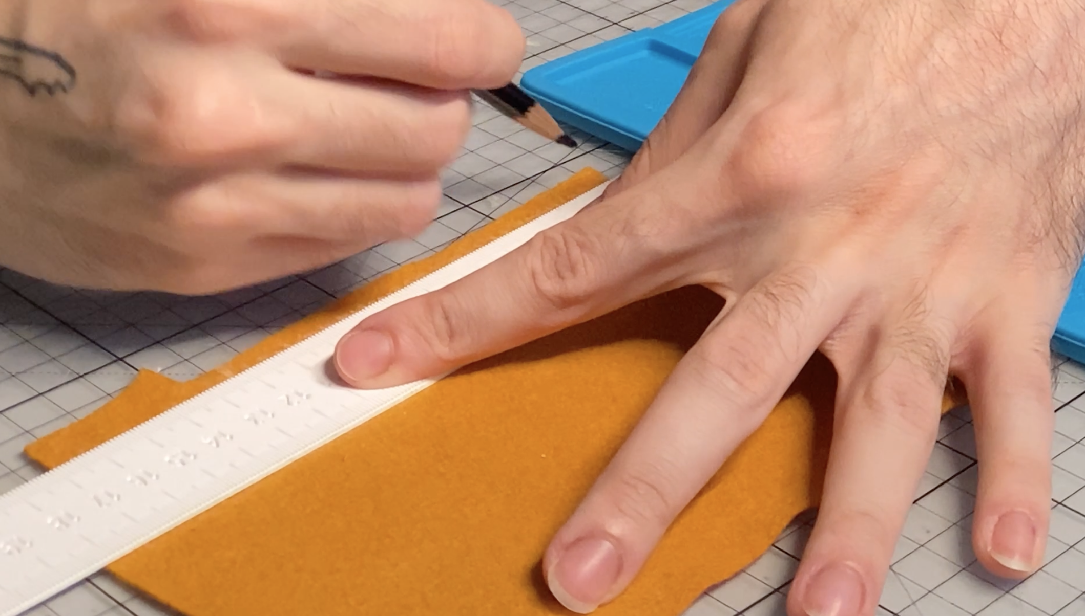 Marking the fabric for later cuts.